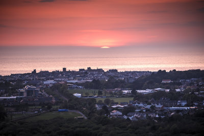 Sun setting beyond Aberystwyth