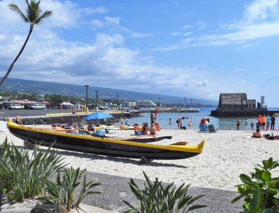 A war canoe on a small beach in Kailua-Kona