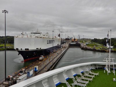 Large auto carier exiting Gatun Locks