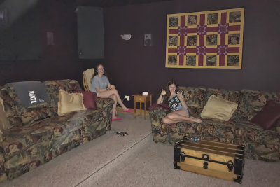 Zoe & Katie relaxing in the home theater room at our rental in Whitefish