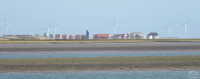 View over Oare Marshes through heavy heat haze.