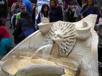 Fountain of the Ugly Boat by Bernini is in front of the Spanish Steps