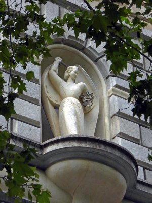 Statue on the pedestrian street called Portal de l'Angel