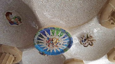 Mosaic tiles on the roof supporting the lower court at Park Guell