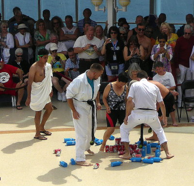 Clearing Cans with Balls while Crossing the Equator