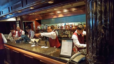 Six Bartenders on Duty for Buy One Get One for a Dollar (BOGO)