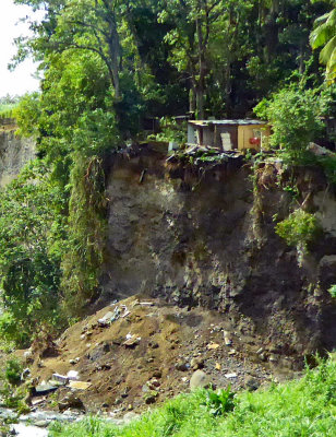 House Surrendering to Erosion in Martinique Rain Forest