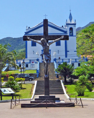 One of Pinna's Sculptures in front of 'Nossa Senhora D'Ajuda Church, Ilhabela, Brazil