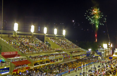 Fireworks announce the arrival of each Samba School before they Parade