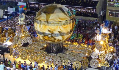 Vila Isabel Float with all Gears turning and Acrobats Flying around the Globe