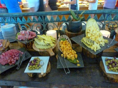 Nice presentation of cold meats, cheeses, & fruit