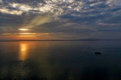 Sunrise over a calm Paracas Bay, Peru
