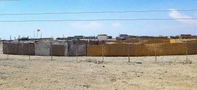 Woven Mat Walls mark property boundaries near Paracas, Peru