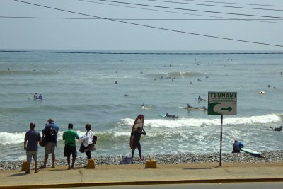 Surfers in the Pacific Ocean at Lima, Peru