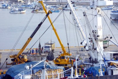 Unloading Tuna Boat with a Crane