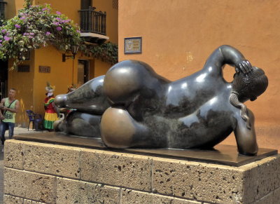 Locals think rubbing one of the Fat Lady Sculpture's Charms brings Good Luck