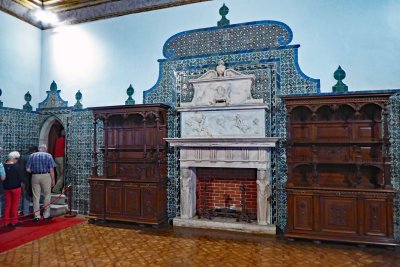 Fireplace surrounded by Azulejo tiles in the Magpie Room of the Palace of Sintra