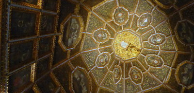 The ceiling of Blazons Hall is decorated with carved, gilded woodwork