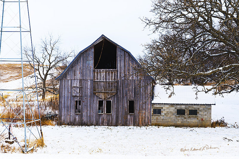 This barn has seen a lot of activity in it's day but on this cold Christmas day it is providing little protection. But in its day ...

An image may be purchased at http://edward-peterson.pixels.com/featured/christmas-barn-edward-peterson.html