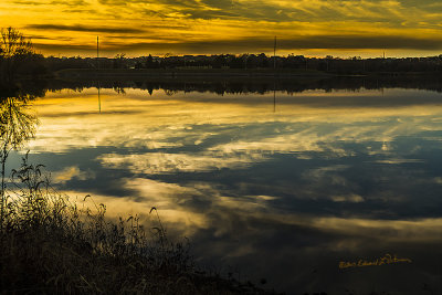 Sunset on Standing Bear Lake on a warm winter day.

An image may be purchased at http://edward-peterson.pixels.com/featured/sunset-on-standing-bear-lake-edward-peterson.html?newartwork=true