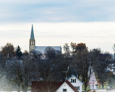 Small town Iowa has some great churches. They may not set thousands or ever hundreds but they have all been built with love. Here is one with a great steeple reaching to the heavens.

An image may be purchased at http://edward-peterson.pixels.com/featured/christmas-day-drive-edward-peterson.html