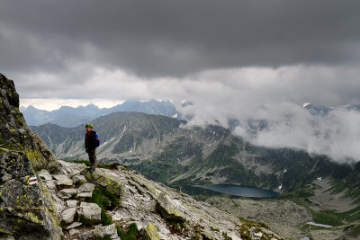 Alex on Swinica 2301m, behind in the bottom Great Polish Lake 1665m in Five Polish Lakes Valley, Tatra NP