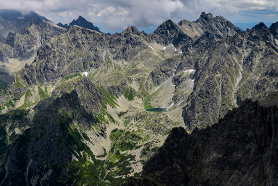 View from Rysy 2503m on Litvorova Valley, on the left in clouds Ladovy stit 2627m, behind on the right Bradavica 2476m, Tatra NP