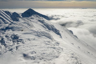 On the summit of Starorobocianski Wierch 2176m, behind Nizna Bystra 2162m peak, Tatra NP