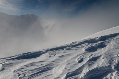 Snow overhang with Jarzabczy Wierch 2137m behind, Tatra NP