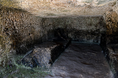 The ancient catacombs above the Greek Theatre, Neapolis Archaeological Park in Siracusa