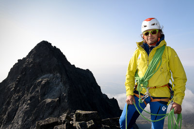 Grzesiek on the summit of Zadný Gerlach 2616m, behind Gerlach Peak 2655m, Tatra NP