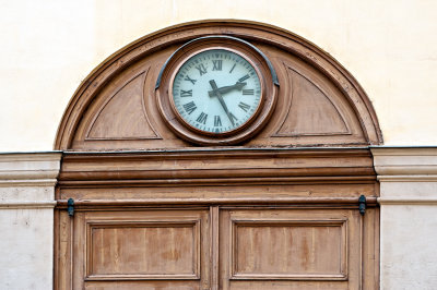 Clock On Wooden Door