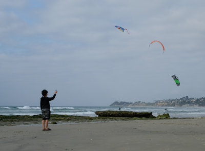 The Little Boy and the Kite Surfers