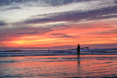 Surfers at Twilight