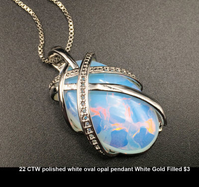 22 CTW polished white oval opal pendant White Gold Filled $3.jpg
