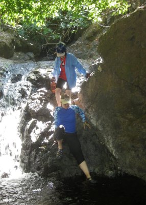 Petra and Maria Descending from the Top of American Creek Falls