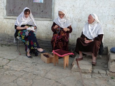 Women in the village of Kubachi, Dagestan (famous for it silver work) often wear these white scarves, embroidered with gold.
