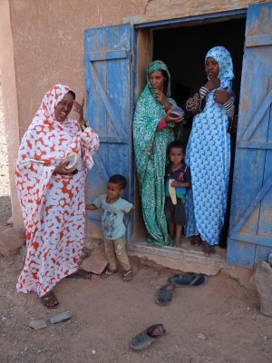 They were happy:  one of our group had just given each woman a solar powered lamp.