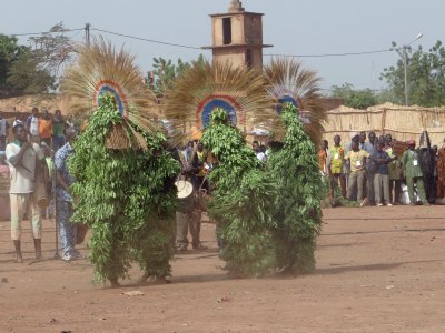The first of our dancers, dressed in leaves!  Festival was held in Dedougou.