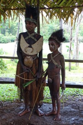 Performers in a village on Lake Mary