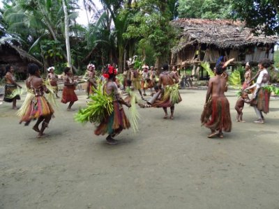 A dance troup in a village on a tributary of the Sepik River.