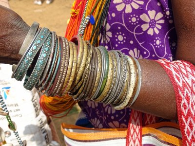 Bangles...every woman wears bangles, lots of them.