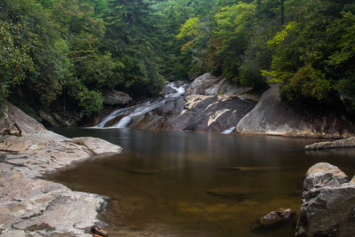 Upper Creek Falls of North Carolina has a number of cascades and waterfalls over a short stretch of Upper Creek.  At the top of everything is this popular swimming hole.