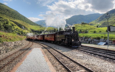 DFB Steam train arriving at Realp station