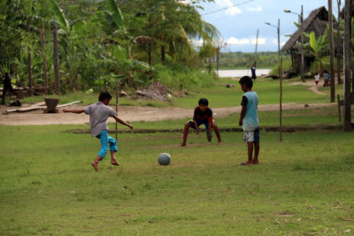 CHILDREN PRACTICING SOCCER