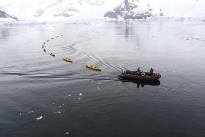 KAYAKS RETURN TO THE QUEST