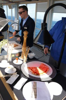 ANOTHER TRADITION: A LAVISH INTERNATIONAL BUFFET ON THE POOL DECK