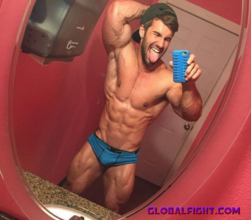 gym jock flexing muscles.jpg