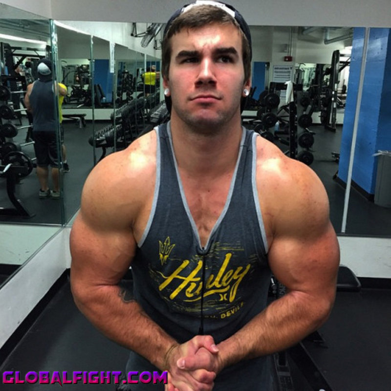 muscle flexing gym webcam.jpg