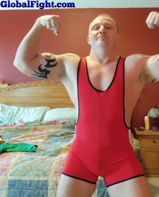 muscle jock wrestler flexing.jpg